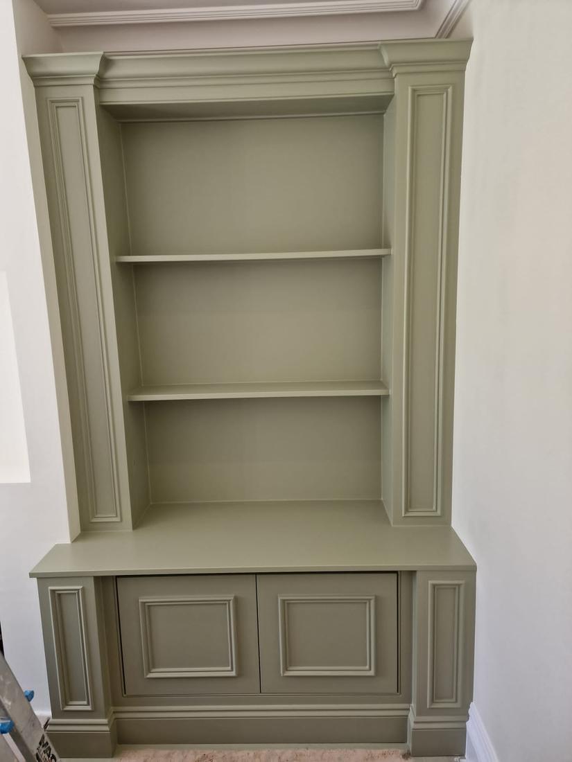 Alcove bookcase hand-painted in sage green