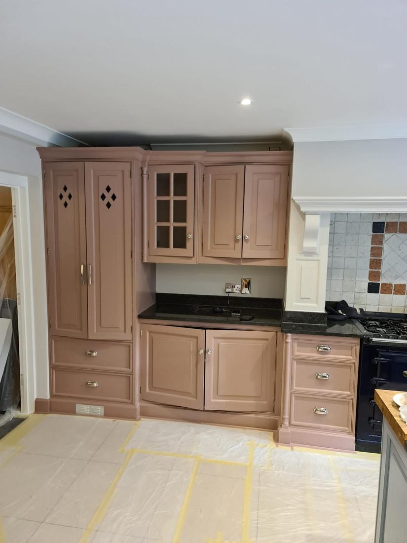 Kitchen cabinetry painted dusky pink